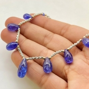 Tanzanite 10-16mm Smooth Drop Shape AA+ Grade Gemstone Beads Layout - Total 1 Strand of 8 Inch.