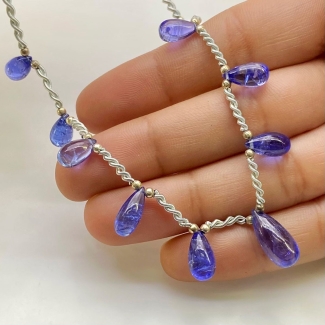 Tanzanite 8-15mm Smooth Drop Shape AA+ Grade Gemstone Beads Layout - Total 1 Strand of 9 Inch.