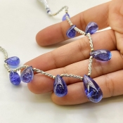 Tanzanite 11-19mm Smooth Drop Shape AA+ Grade Gemstone Beads Layout - Total 1 Strand of 8 Inch.