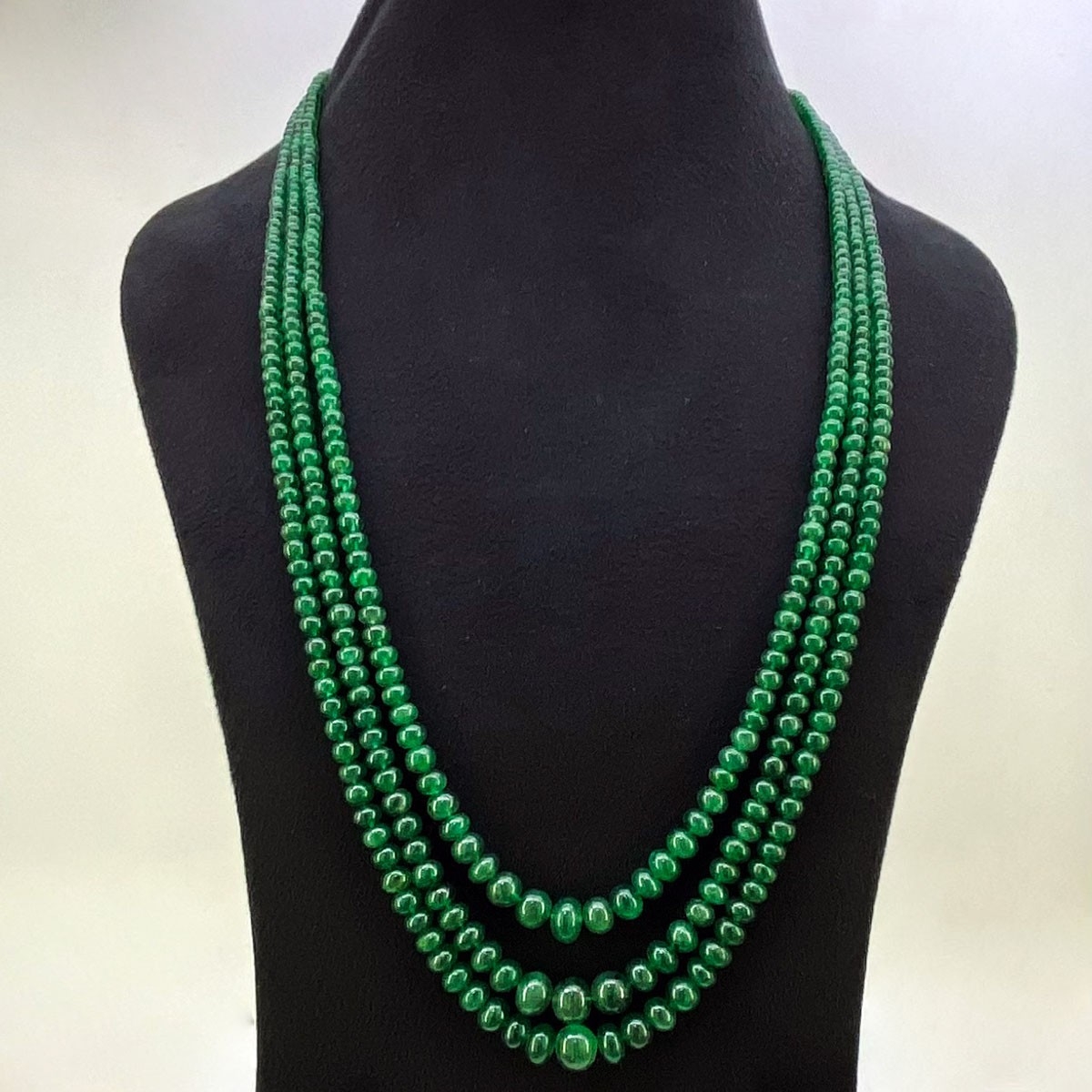 Emerald rondelle bead necklace with sterling silver spacers and