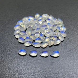 16.5 Cts. Rainbow Moonstone 5x3mm Smooth Pear Shape AA+ Grade Cabochons Parcel - Total 70 Pc.