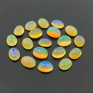 9.78 Cts. Ethiopian Opal 7x5mm Smooth Oval Shape AA Grade Cabochons Parcel - Total 19 Pc.