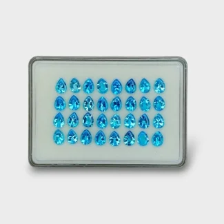 41.2 Cts. Swiss Blue Topaz 8x6mm Buff Top Pear Shape AAA Grade Gemstones Parcel - Total 32 Pc.