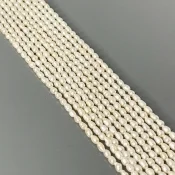 Pearl 2mm Smooth Rice AA+ Beads Strand - 184099