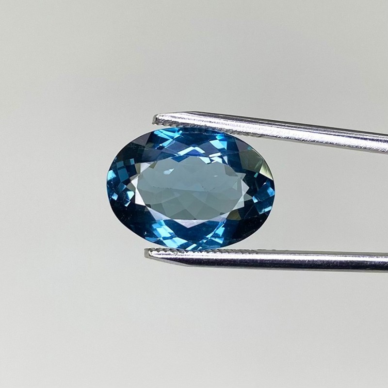  8.56 Cts. London Blue Topaz 11.19x15.43mm Faceted Oval Shape AAA Grade Loose Gemstone - Total 1 Pc.