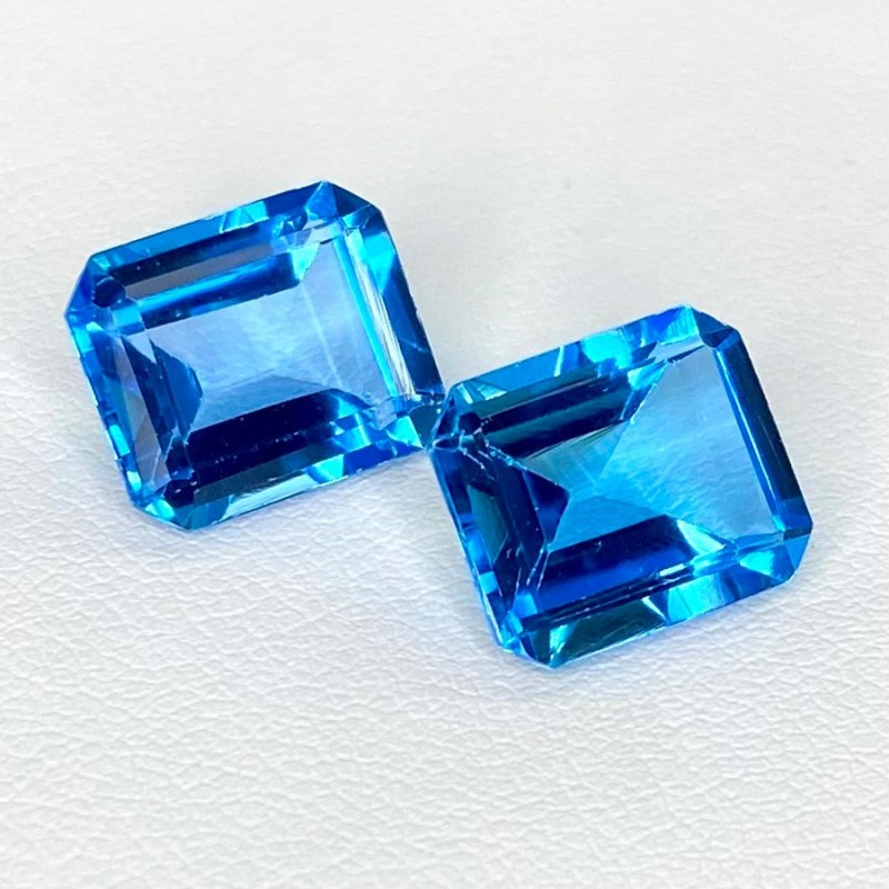  13.74 Cts. Swiss Blue Topaz 12x10mm Step Cut Octagon Shape AAA Grade Matched Gemstones Pair - Total 2 Pcs.