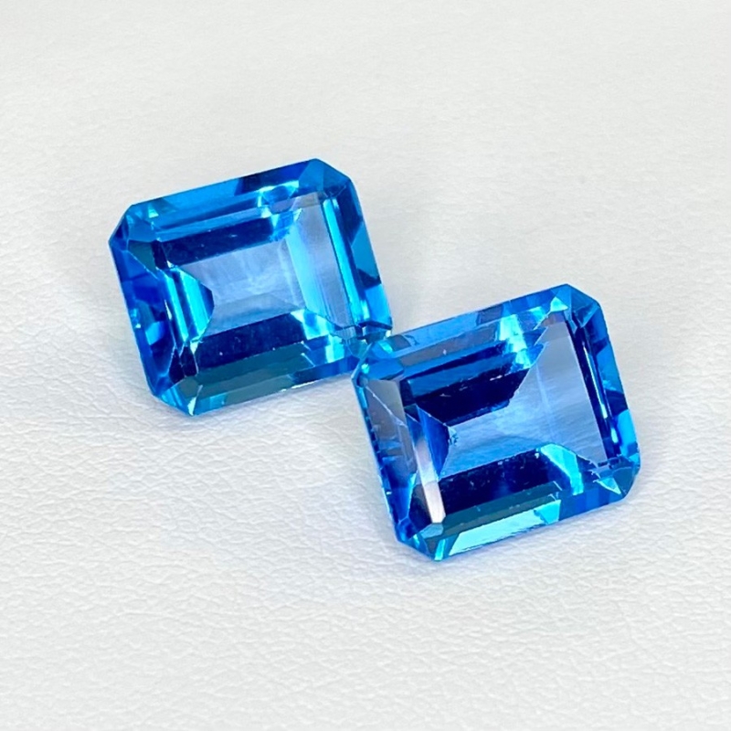  15.13 Cts. Swiss Blue Topaz 12x10mm Step Cut Octagon Shape AAA Grade Matched Gemstones Pair - Total 2 Pcs.