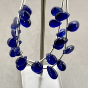 Blue Sapphire 7-11.5mm Smooth Pear Shape AA+ Grade Multi Strand Beads Layout - Total 2 Strands of 4-5 Inch